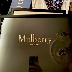 Framed picture of Mulberry packaging